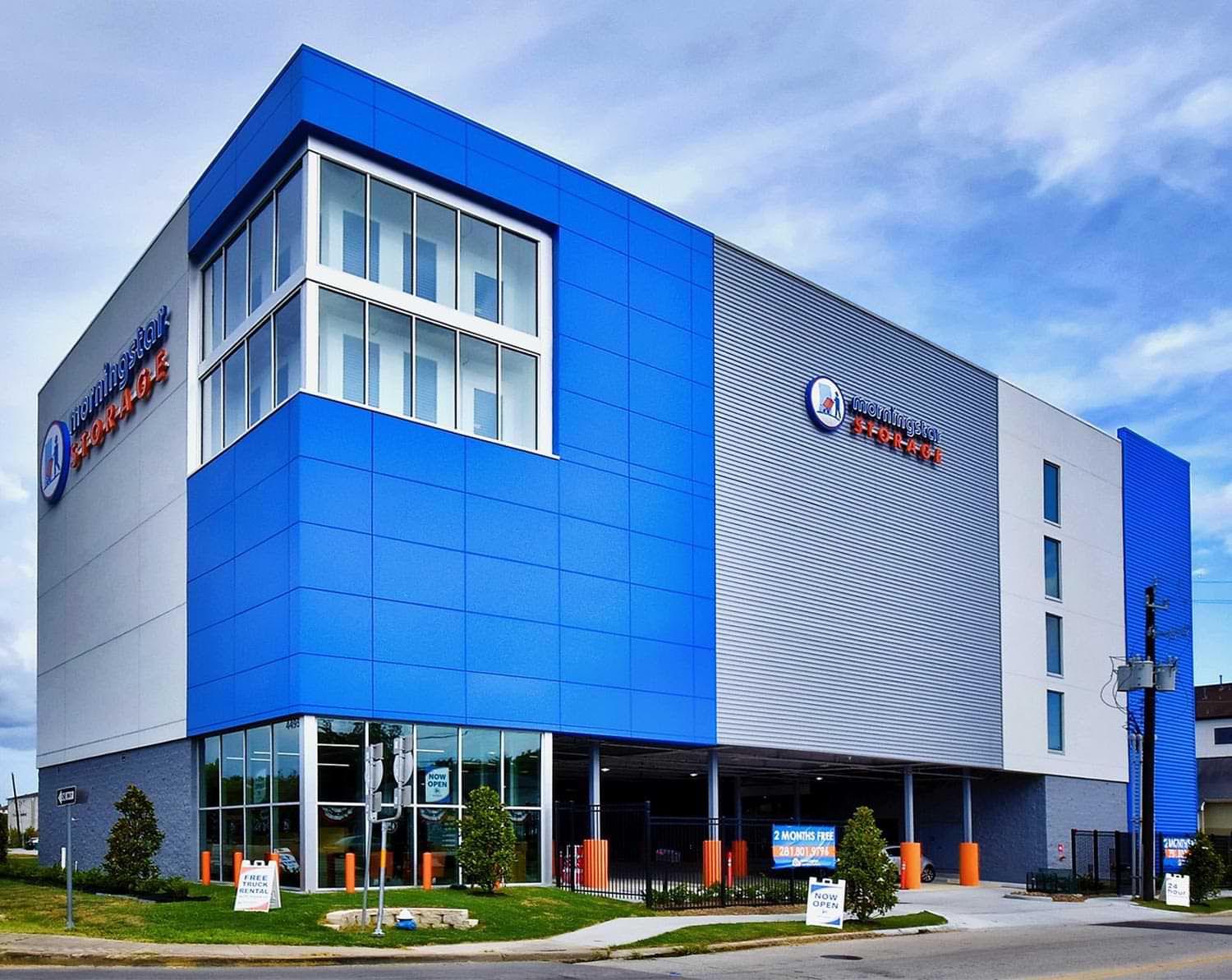 external view of the 5 story blue and orange schemed Morning Star Storage facility located in Houston