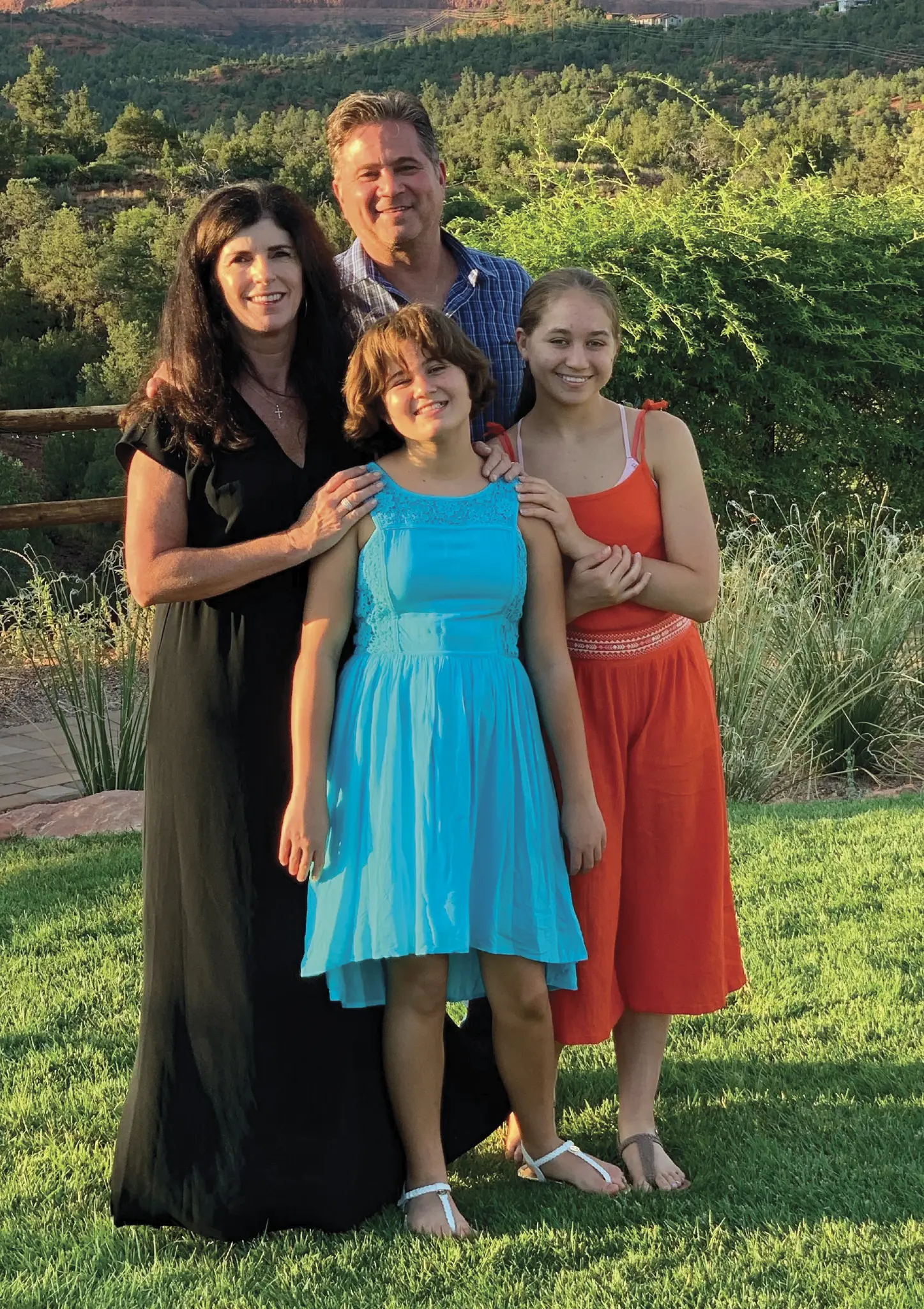 Belinda, Mario, and his daughters Abby and Ashley 