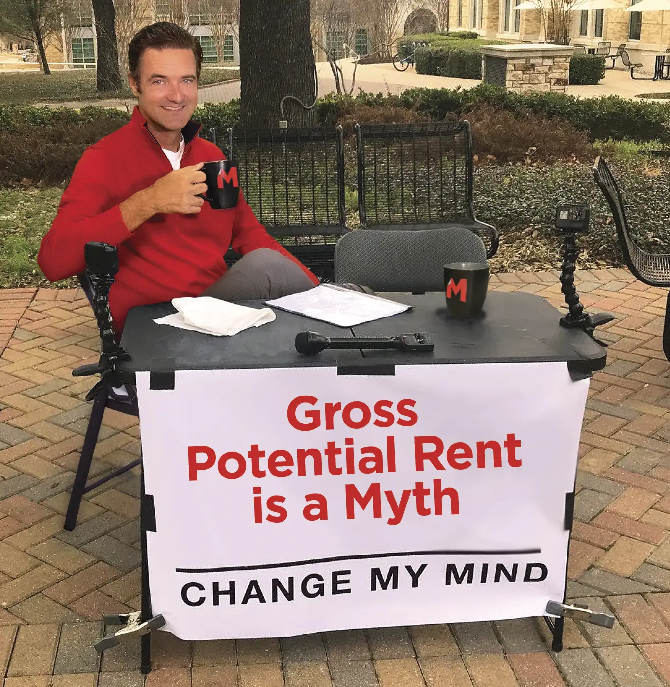 Travis Morrow as a popular meme with Gross Potential rent is a myth Change My Mind written on a banner
