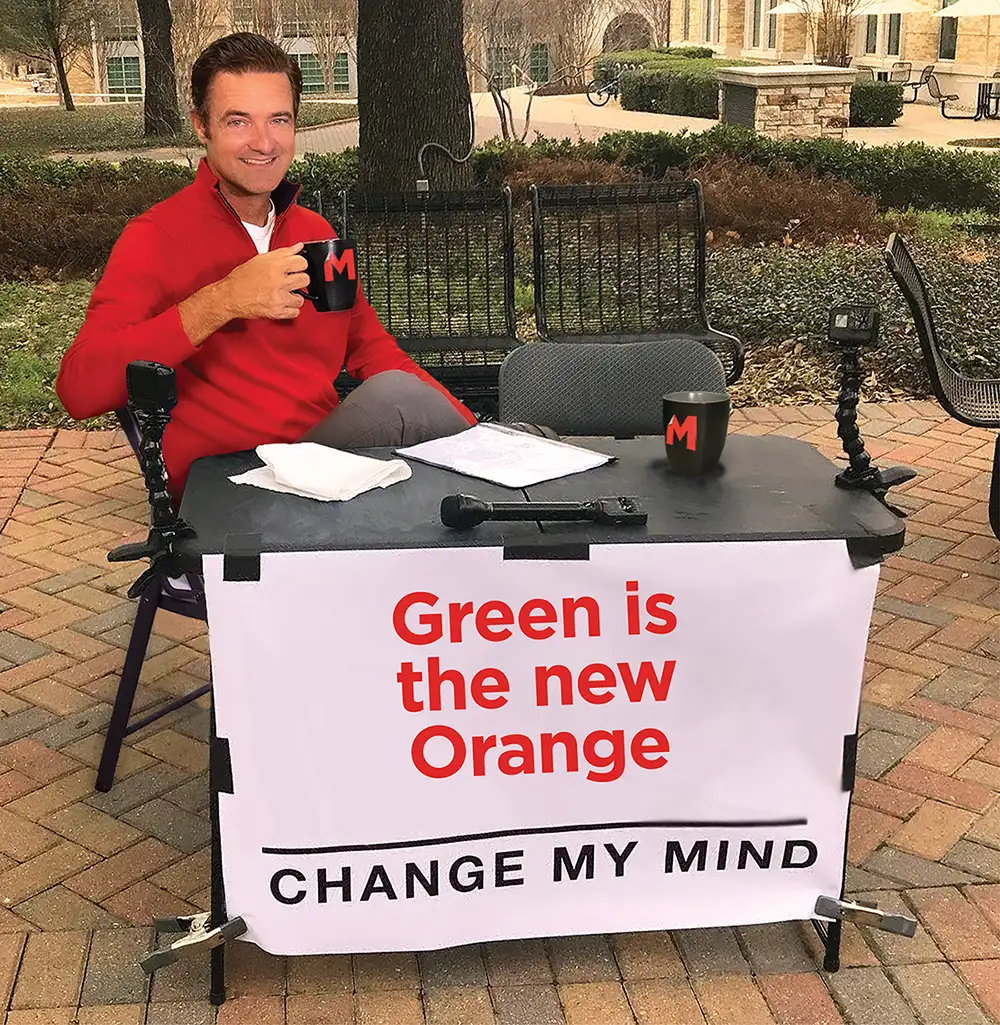 Travis Morrow as popular internet meme with Green is the new Orange Change My Mind sign