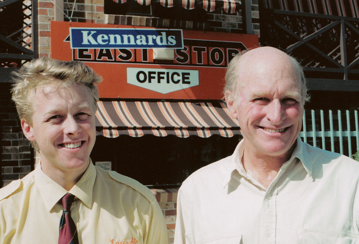 Sam and Neville Kennard standing in front of one of their self-storage buildings