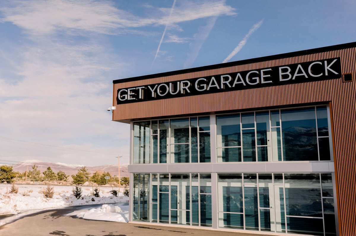 storage facility with "Get Your Garage Back" sign