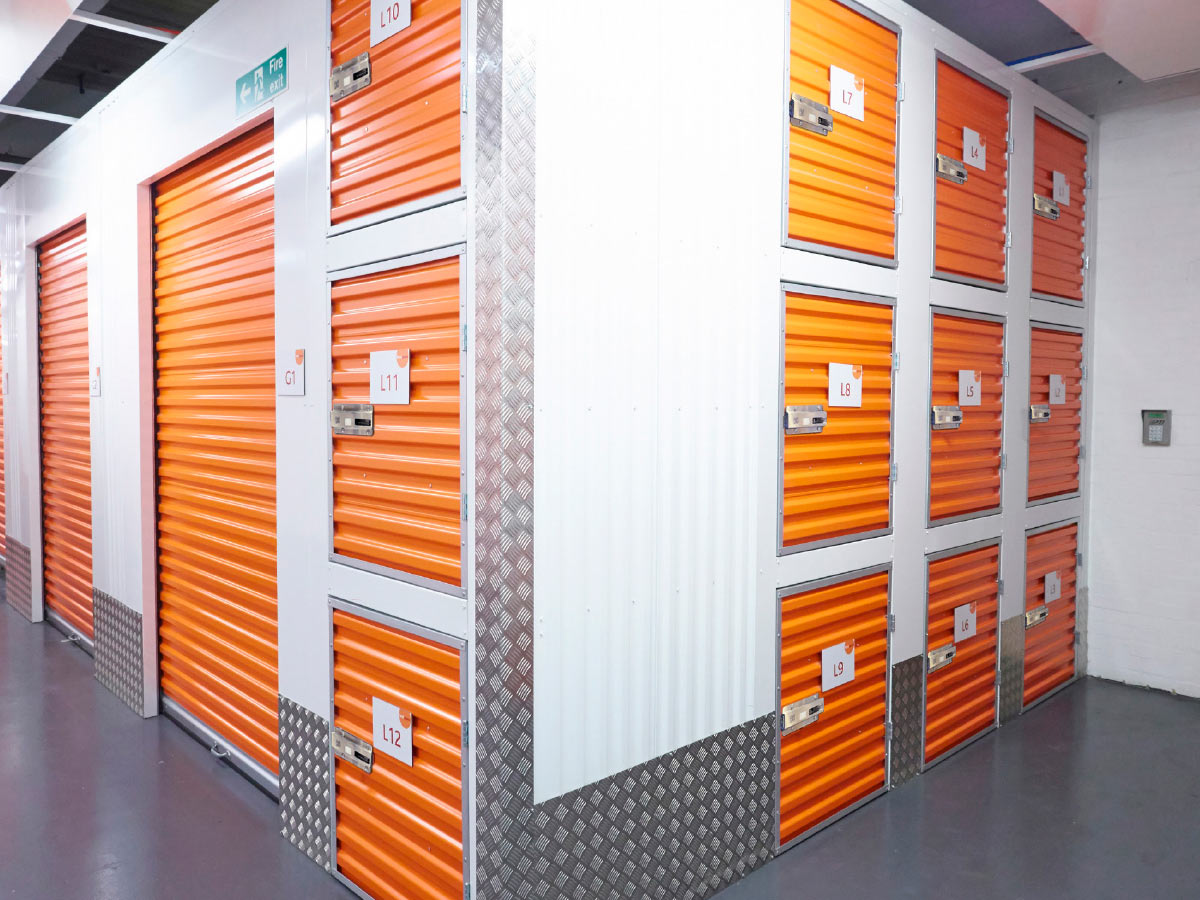 storage facility with different sized orange storage doors