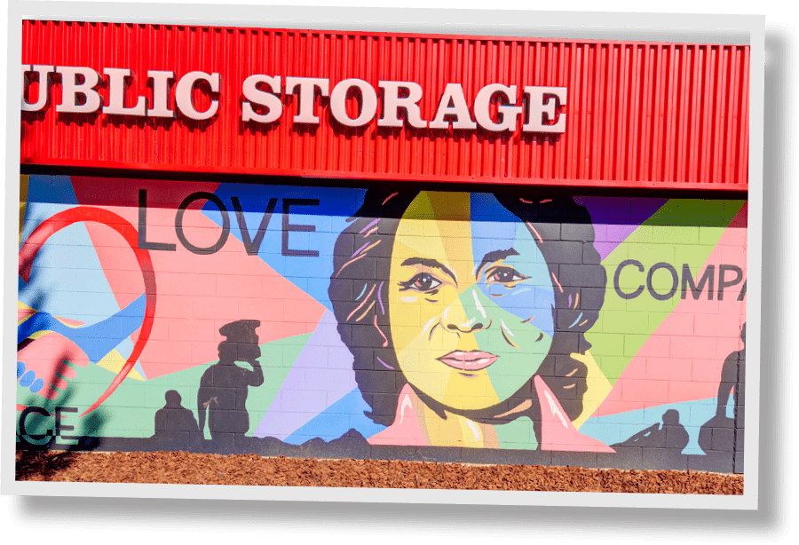 security public storage mural with historic figure Rosa Parks and the word love
