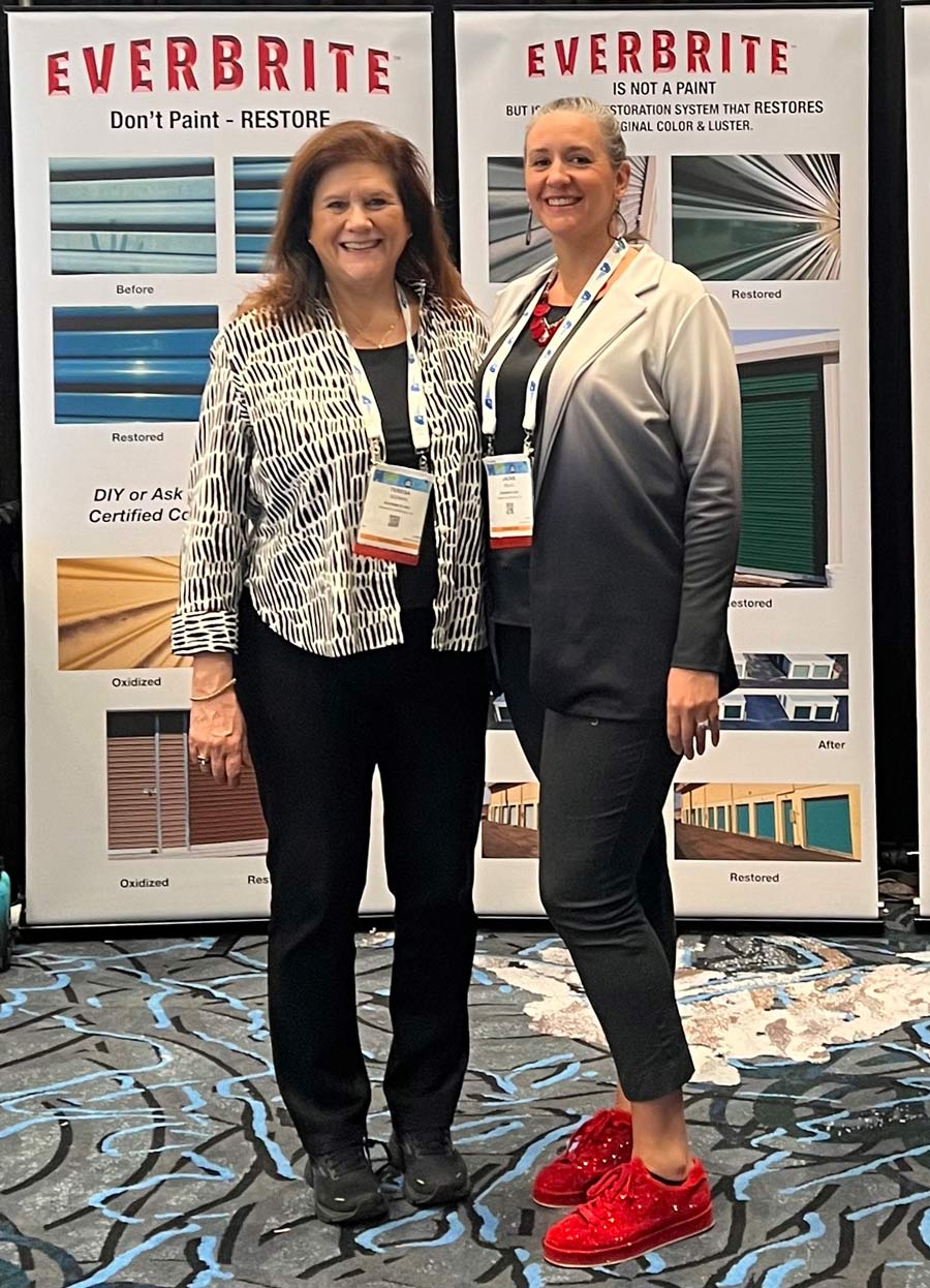 two women standing next to each other posing for a photo