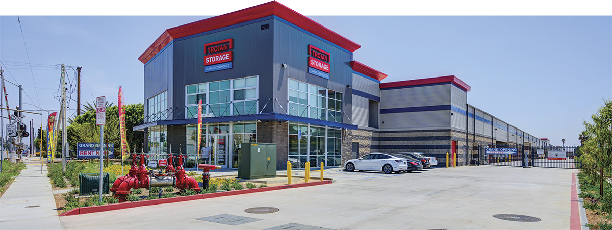 Trojan Storage Facility with Grand Opening signs