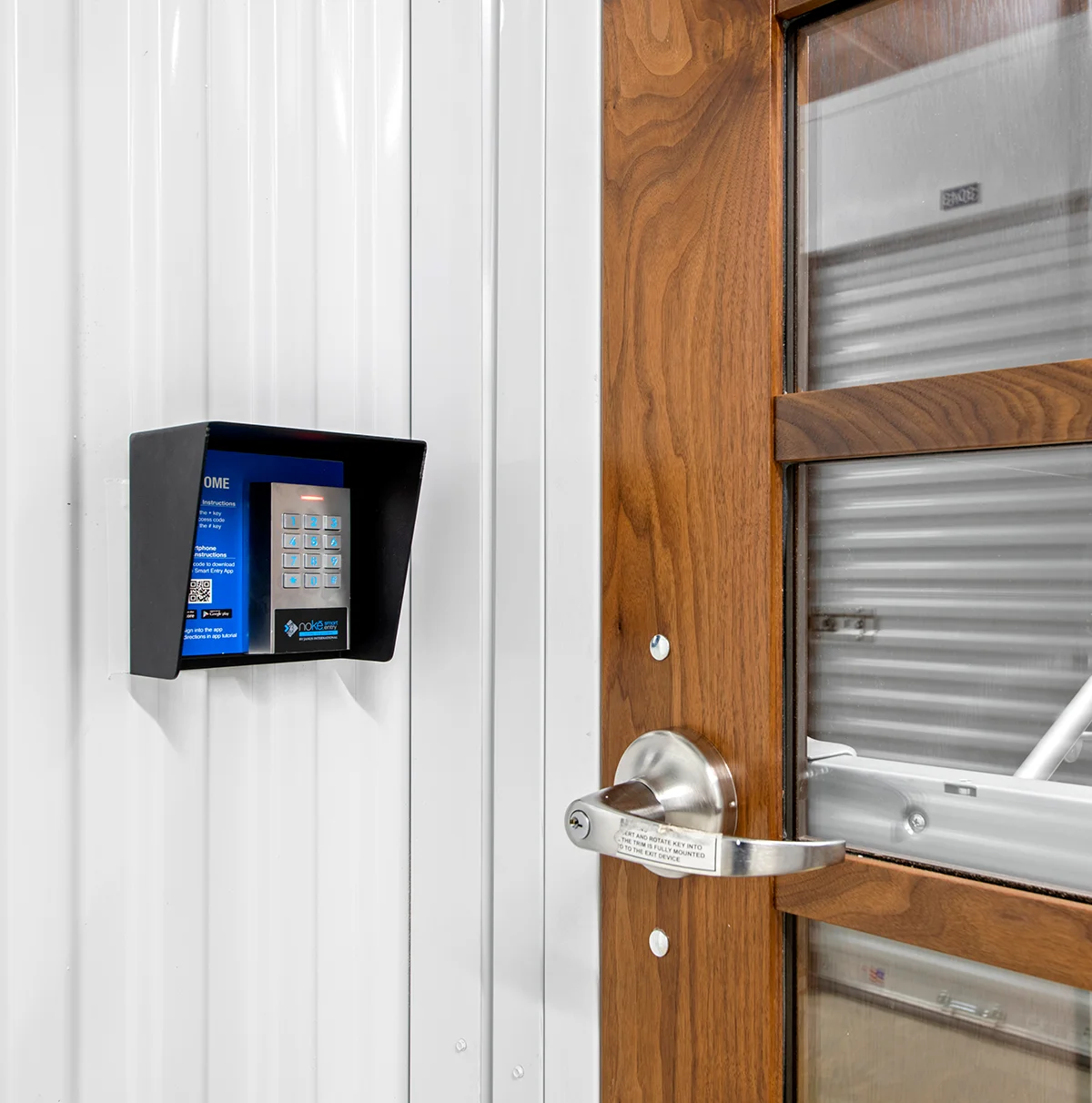 close view of a keypad and door at the Compass Self Storage facility