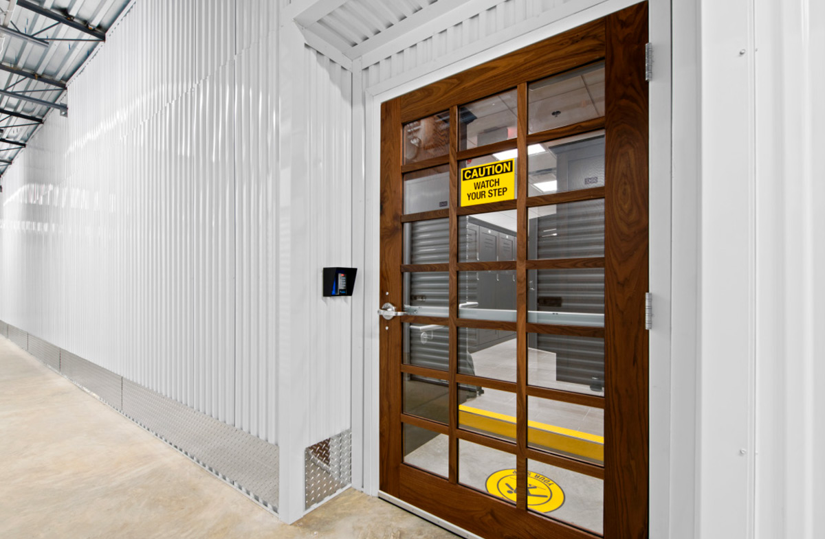 wide view of a keypad and door at the Compass Self Storage facility