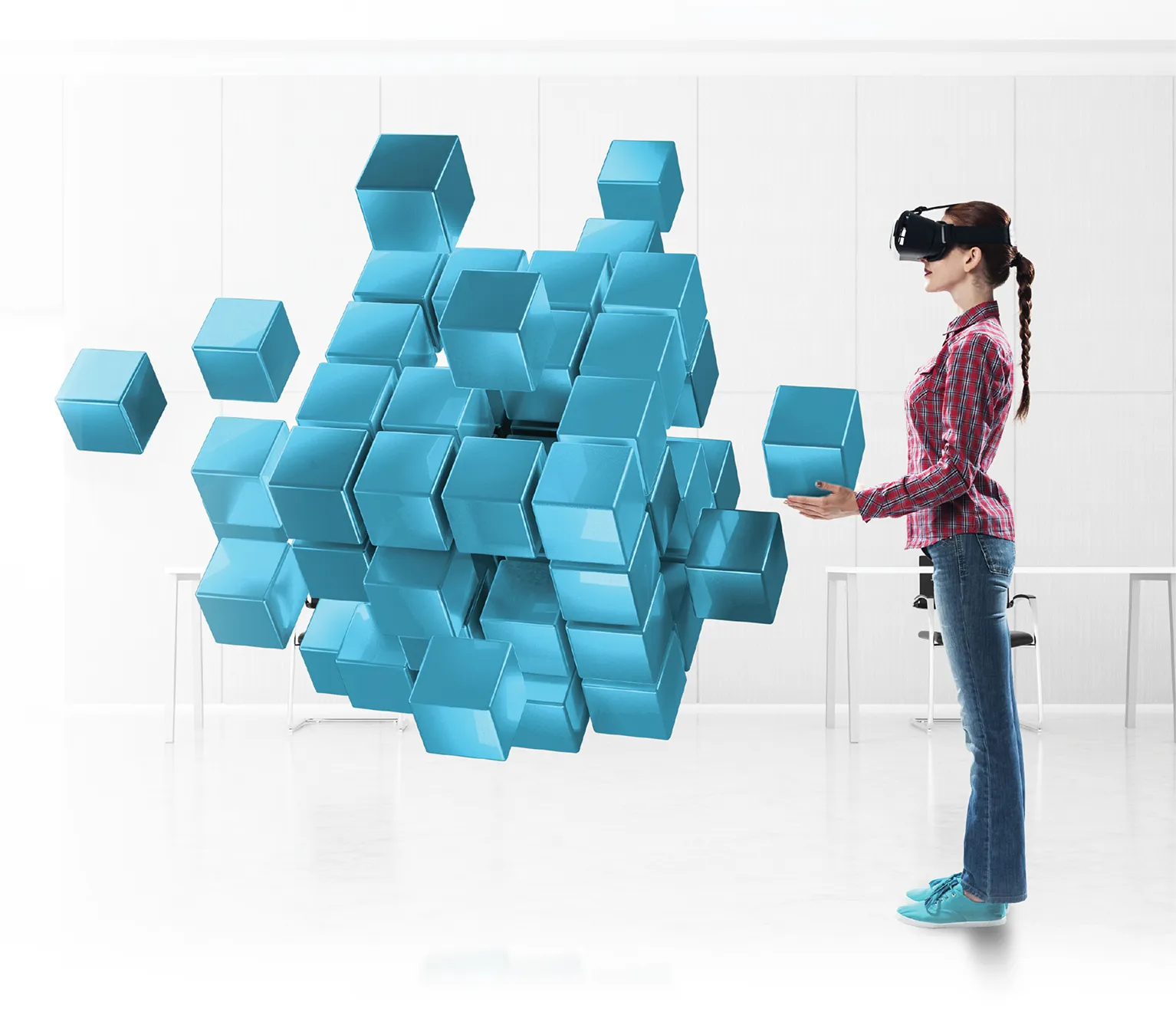 A person wearing a virtual reality headset interacts with a large cluster of blue 3D cubes floating in the air. The scene takes place in a minimalist, modern, white room with clean lines and bright lighting.