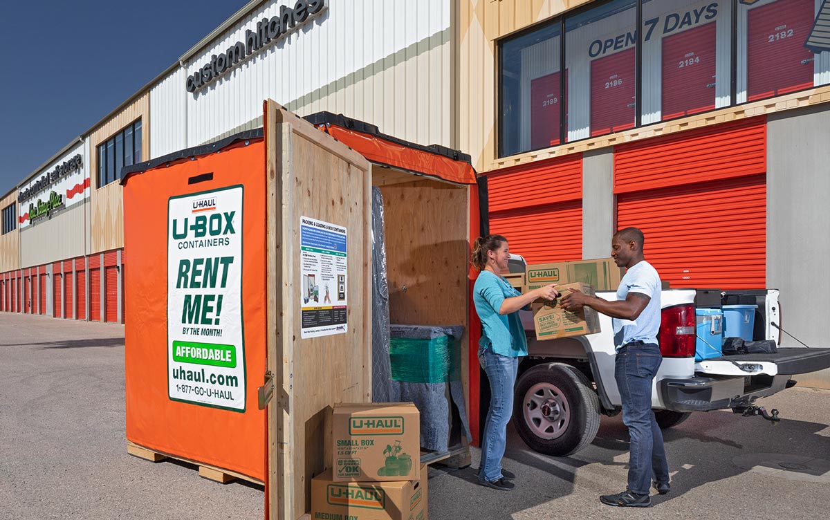 two customers loading a U-Box portable storage container at Litchfield Park, Ariz., location