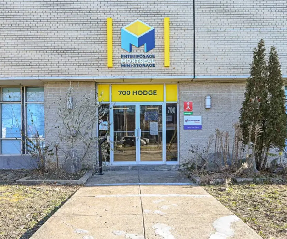 Portrait outdoor exterior photograph view of the Montreal Mini-Storage Ville Saint-Laurent branch facility building during the day located at 700 rue Hodge, Ville Saint-Laurent, QC