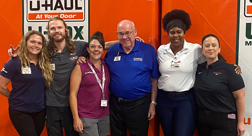 U-Box Warehouse Colorado Springs team picture with Joe Shoen and his daughter Royal