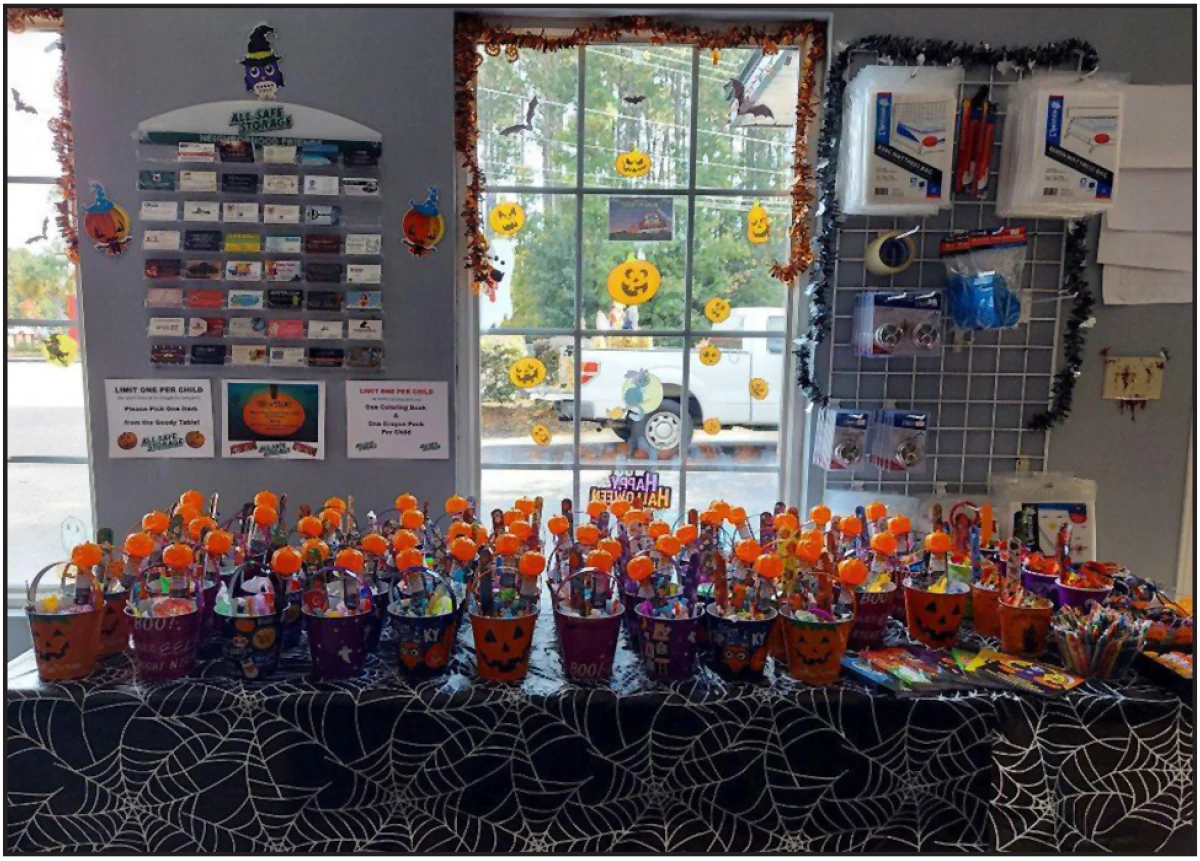 Halloween themed goodie bags displayed on table