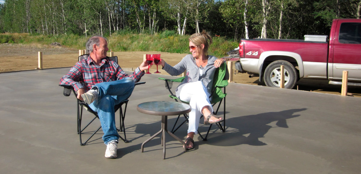 Goodin and his wife drinking a glass of wine together