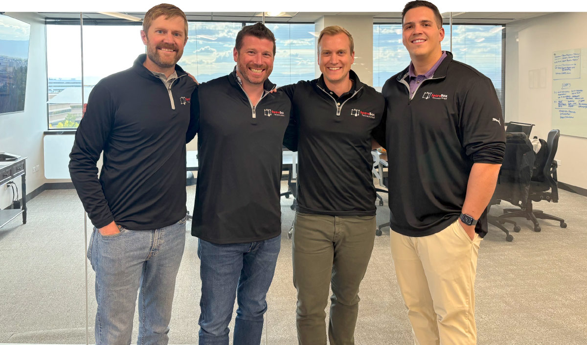 group photo of Will Harlan, Matt Rundel, Jackson Stevens, and Patrick Johnson