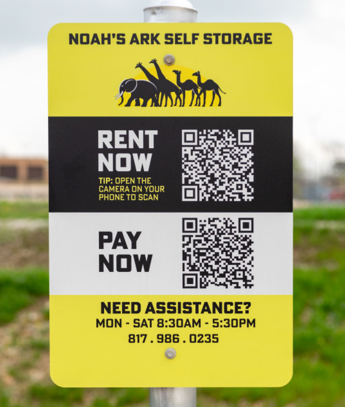 sign with instructions to scan QR codes for renting and payments