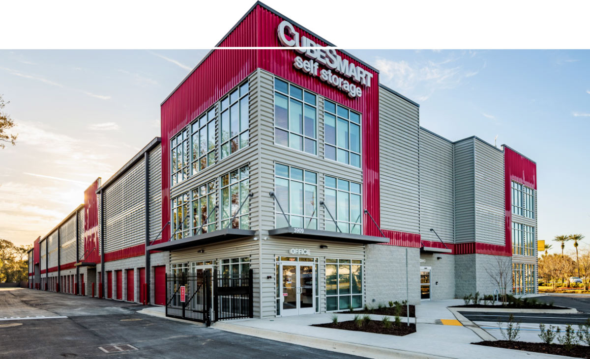Exterior daytime photo of a large, modern CubeSmart Self Storage facility