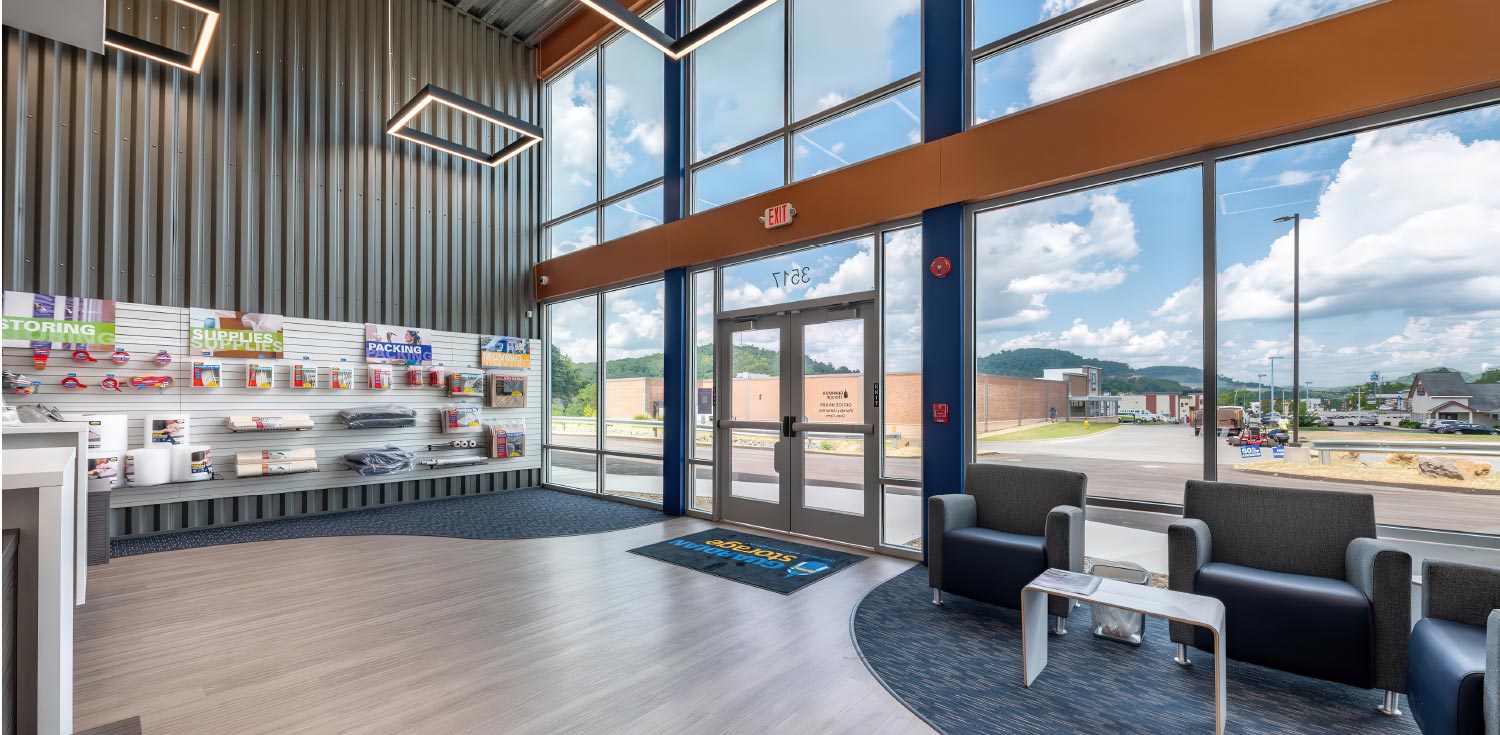lobby inside of Guardian Storage with shelves stocked with storage supplies 