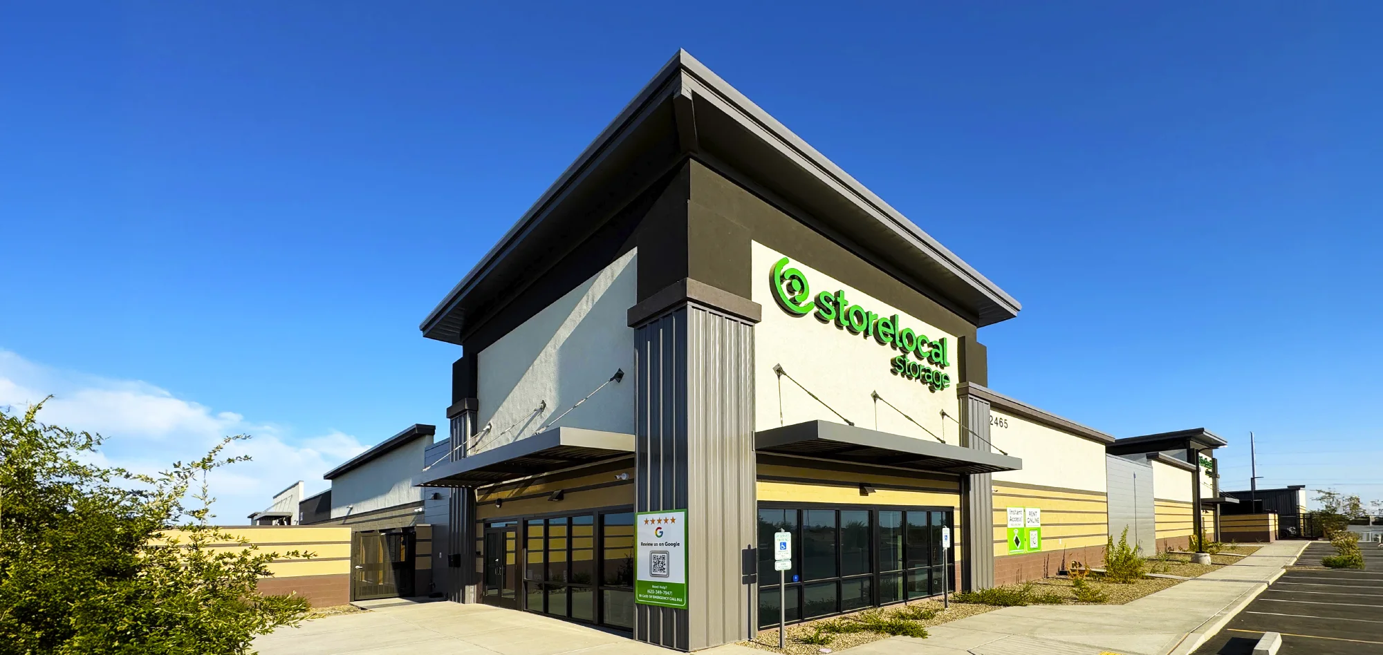 Modern, two-story exterior of the Storelocal Storage facility office in Surprise, Arizona.