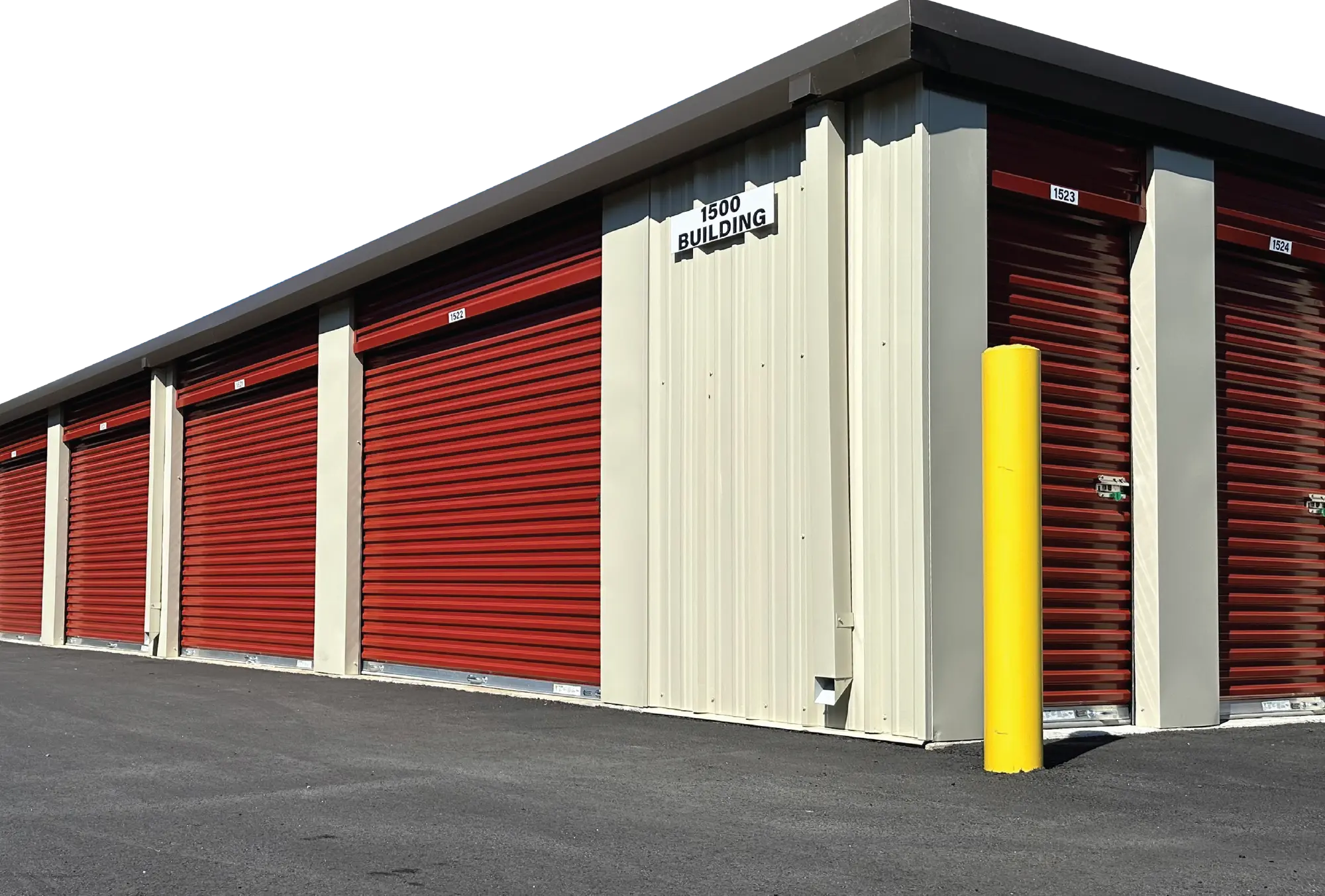 1500 building at a storage facility with red doors