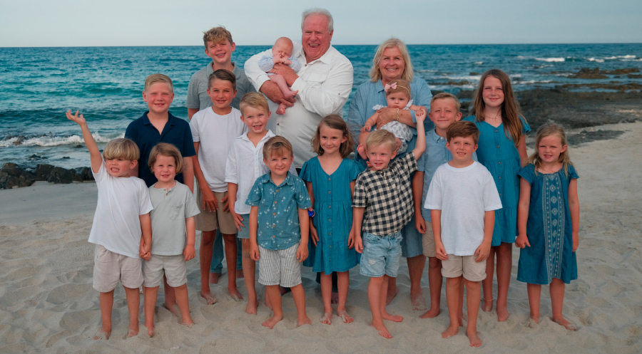 Kelly "Pappa" and Marlene "Grandma Bubbles" Gallacher with 15 of their 19 grandchildren