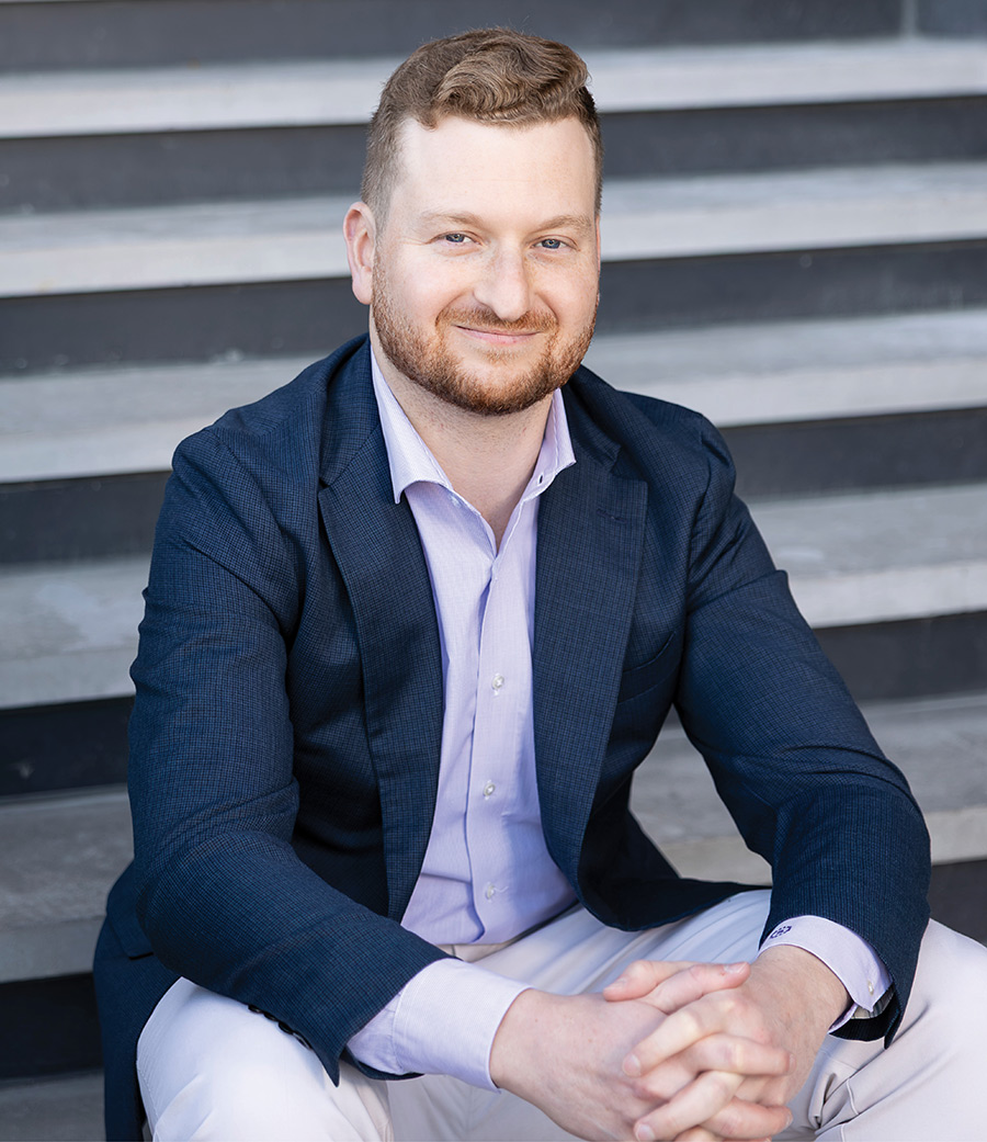 Noah Starr sitting on steps