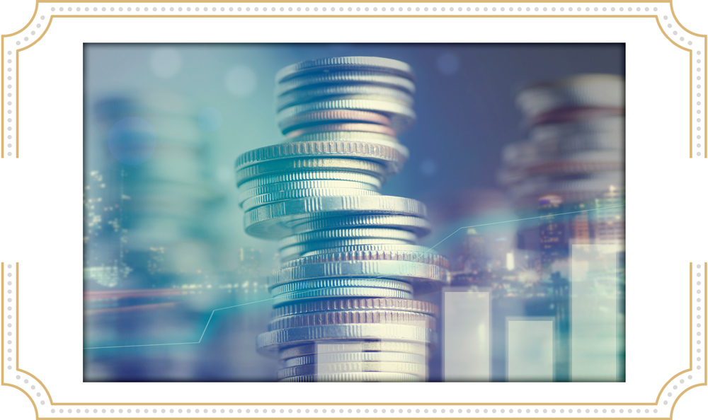Stacks of coins with a blurred cityscape background and an overlaid line graph.