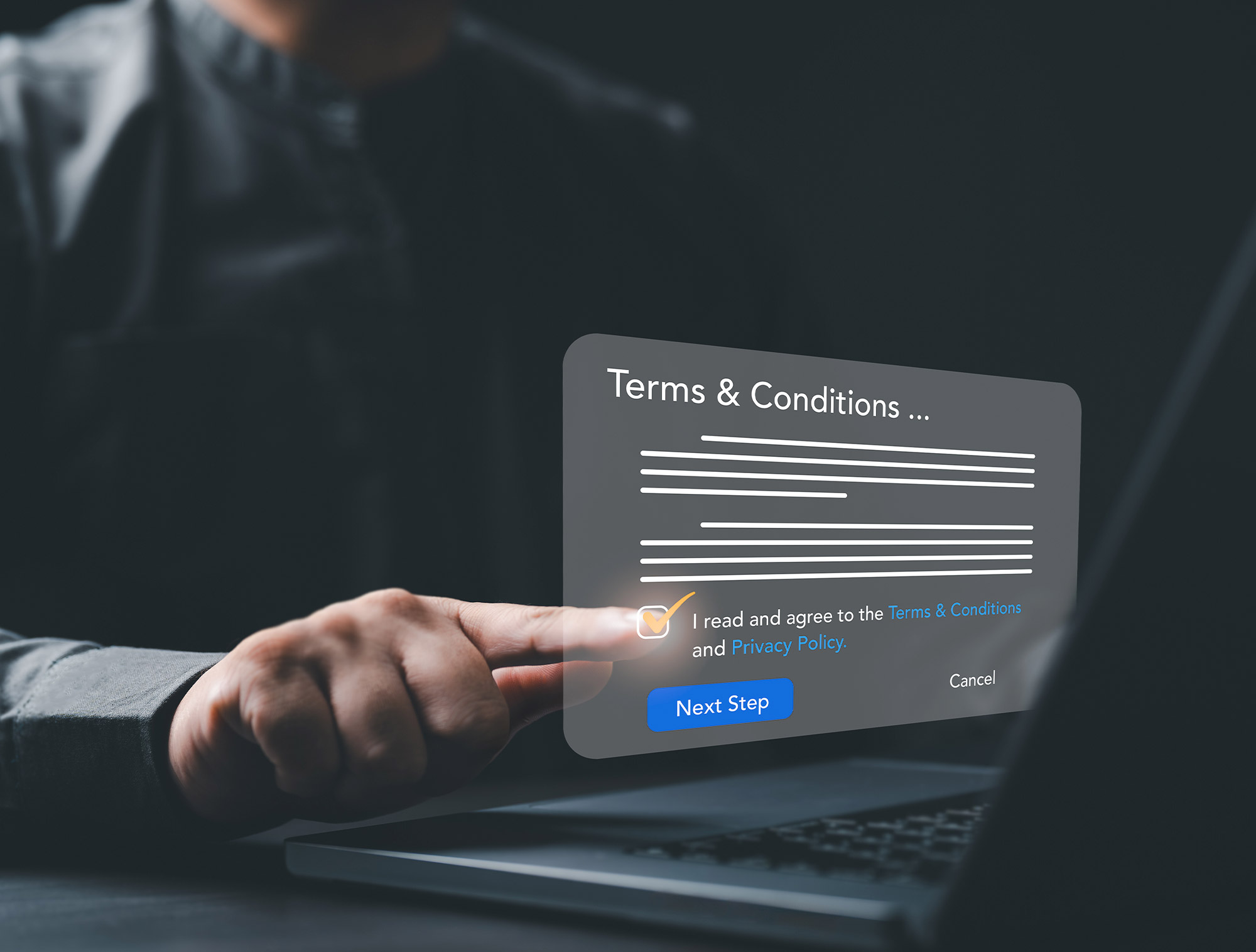 A person's finger touches a digital "Terms & Conditions" pop-up window on a laptop screen. The window shows a checked box next to an agreement statement and a blue "Next Step" button.