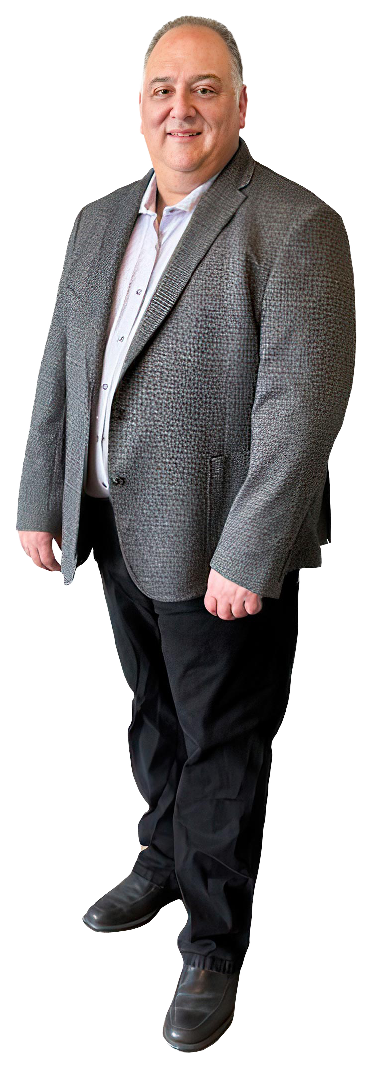 Full body photo of Jeff Herszkowicz in a grey textured blazer and black pants
