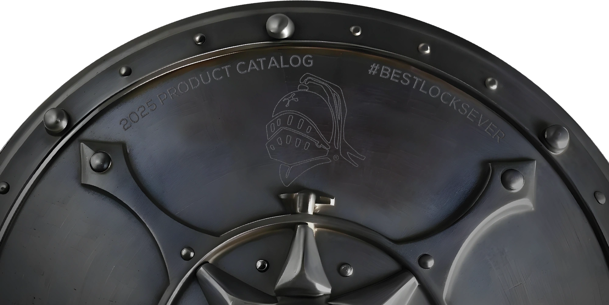 Close-up of a metallic shield with engraved text and a helmet design.