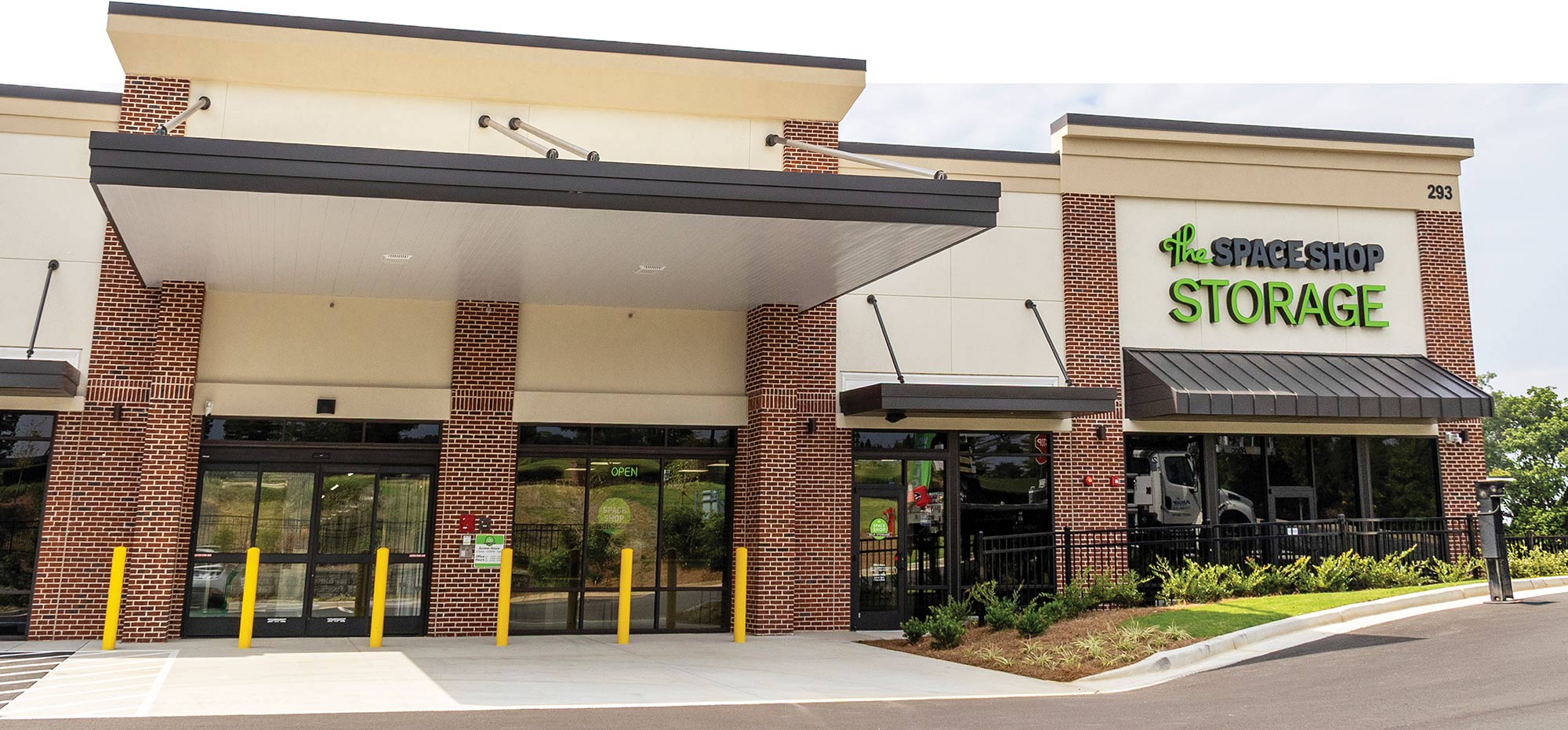 Exterior view of The Space Shop Storage building with brick columns.