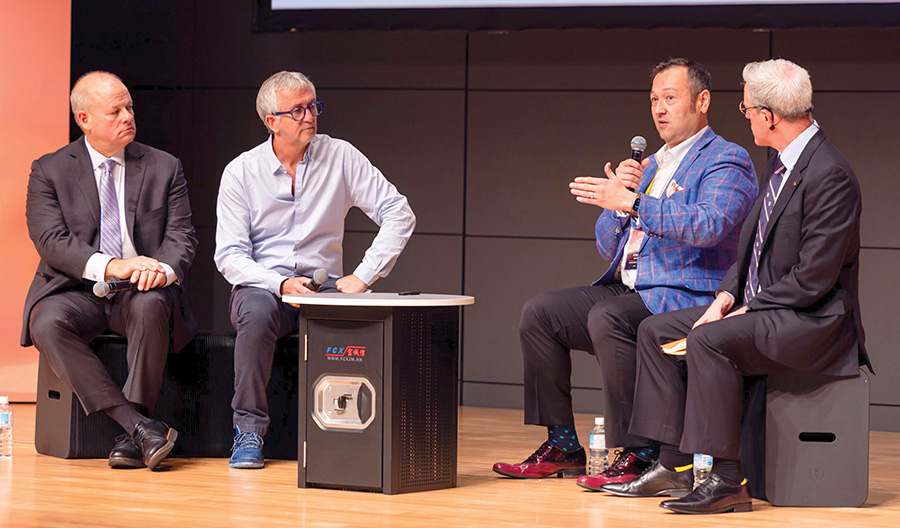 Robert Madsen Speaking During A Discussion At Self Storage Expo Asia In Tokyo.