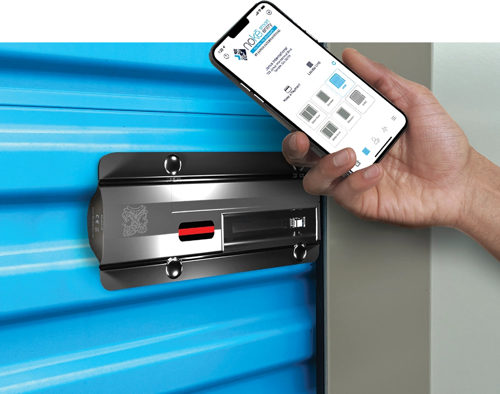 A hand holding a smartphone with the Nokē Smart Entry app near a electronic lock on a blue storage door.